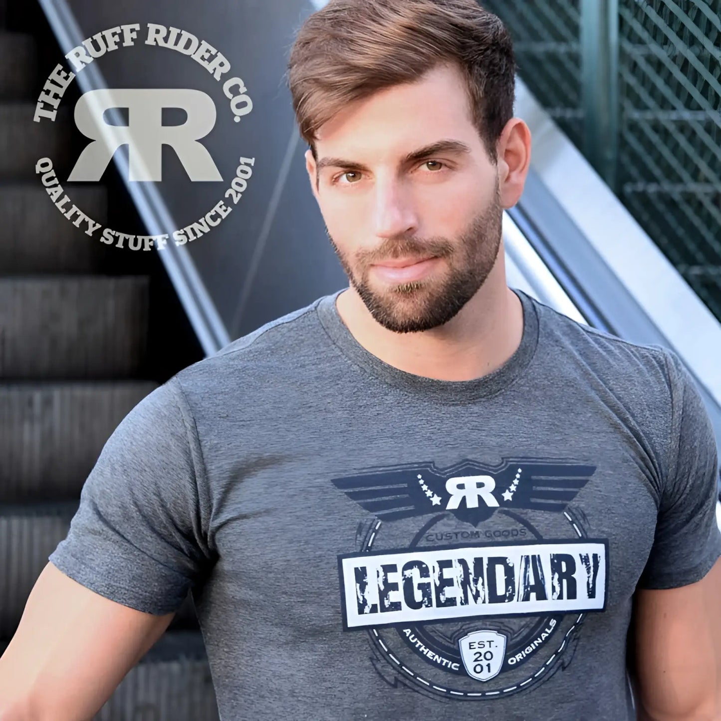 Gray heathered short sleeved t shirt with black and white legendary graphic wings stars by ruff rider co size l
