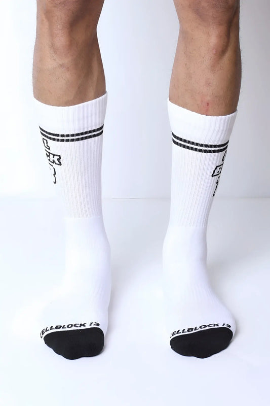 White starter crew socks with black toe caps two stripes and subtle logo on each leg made from soft cotton blend
