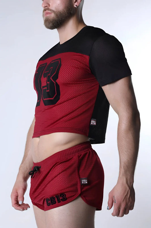 Red mesh starter crop top and matching shorts with black number 13 design perfect for athletic wear