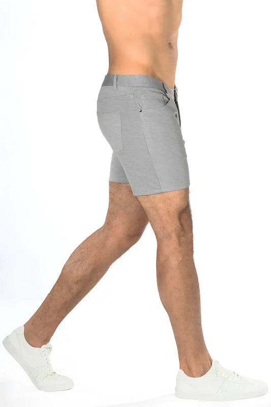 Gray stretch knit shorts with textured fabric and subtle stitching details in a sleek modern design