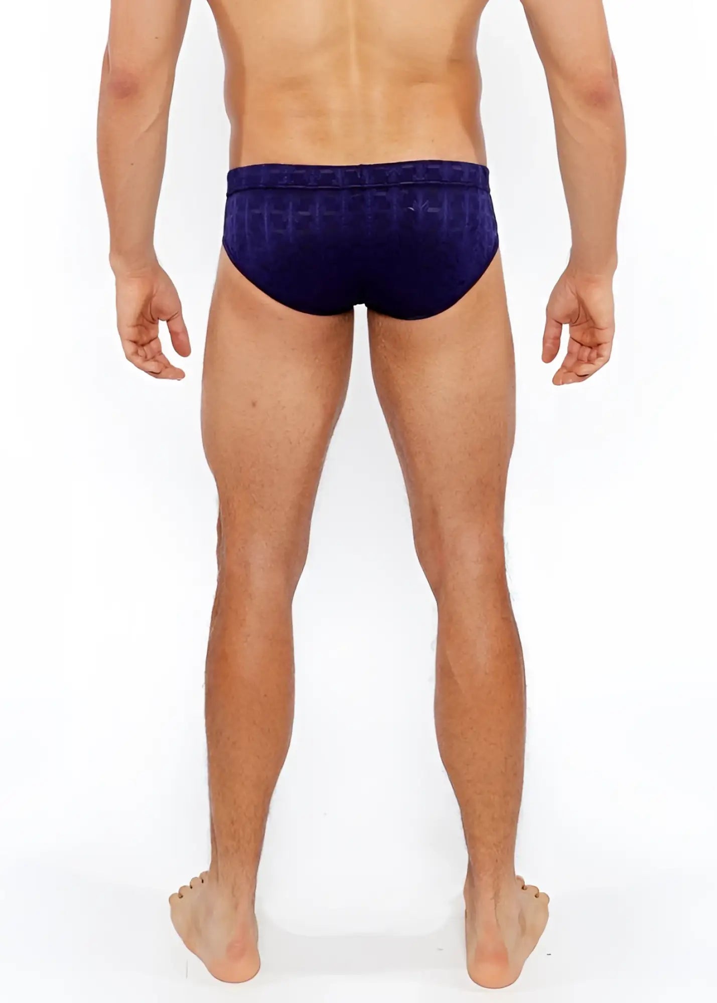 Navy blue textured swim brief with front buckle featuring a geometric pattern ideal for swimming and beachwear