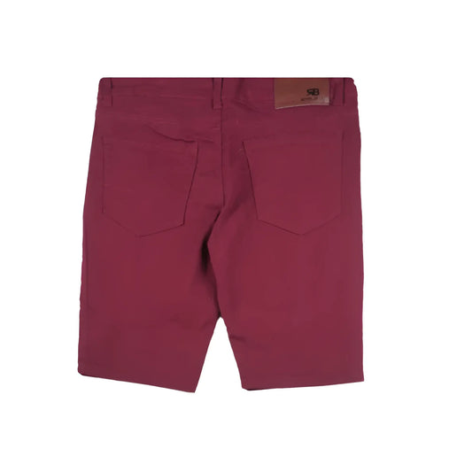 Maroon twill stretch skinny denim shorts with a brown leather brand patch on the waistband back view