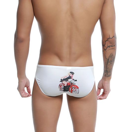 White swim trunks featuring a red motorcycle and pin-up girl graphic from the u-station rider bikini u0022-110 collection