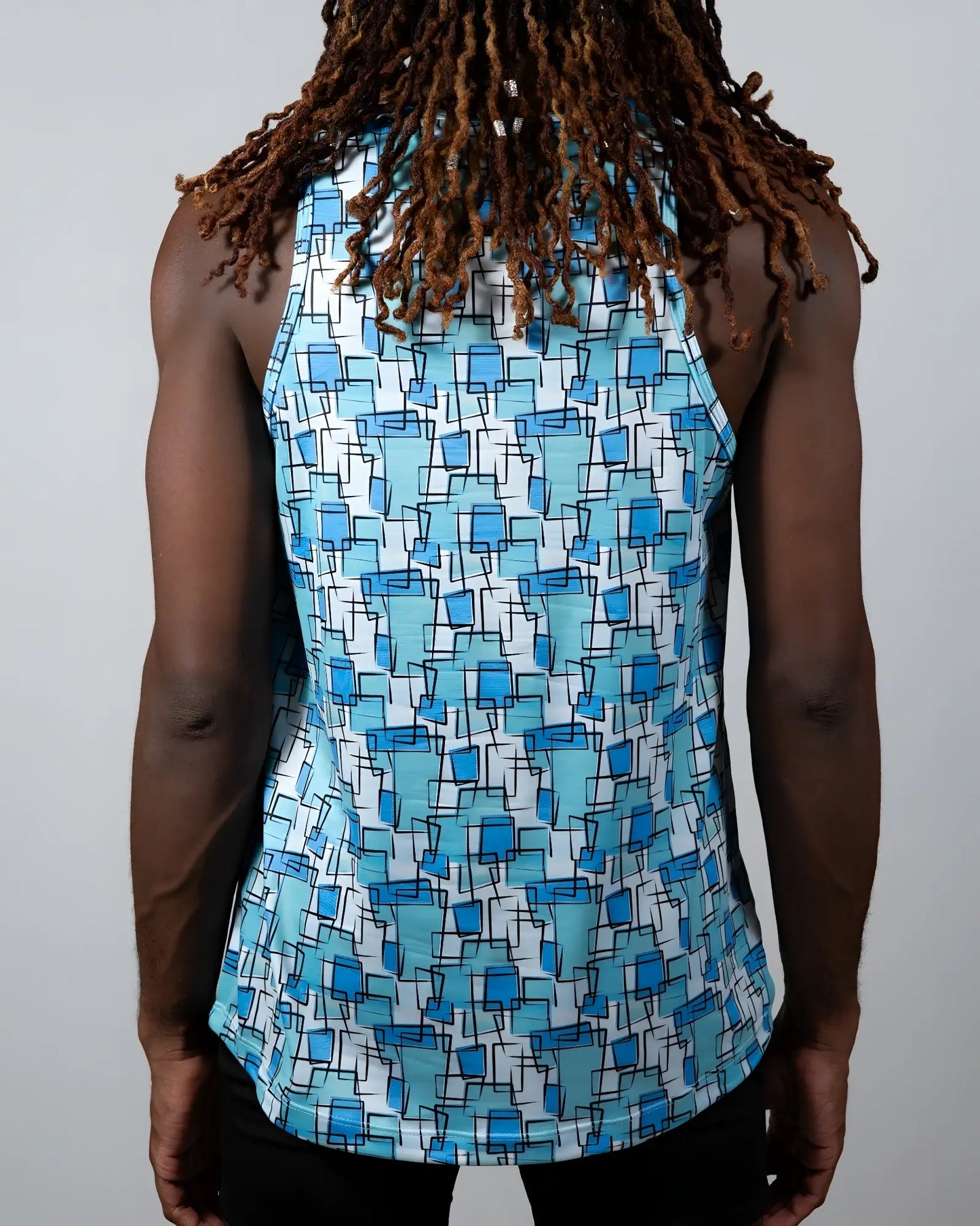 A blue and white geometric patterned wallpaper print tank sleeveless top ideal for casual summer wear