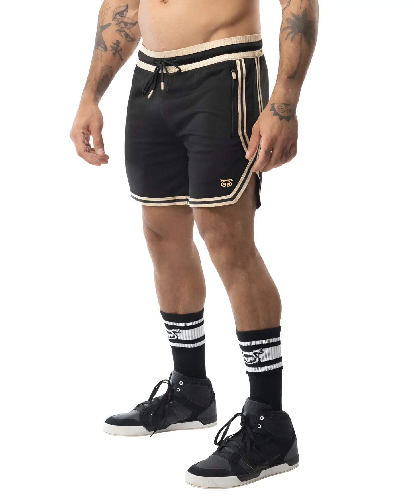 Black warm up rugby shorts with cream trim and side stripes featuring small embroidered logo on lower left leg