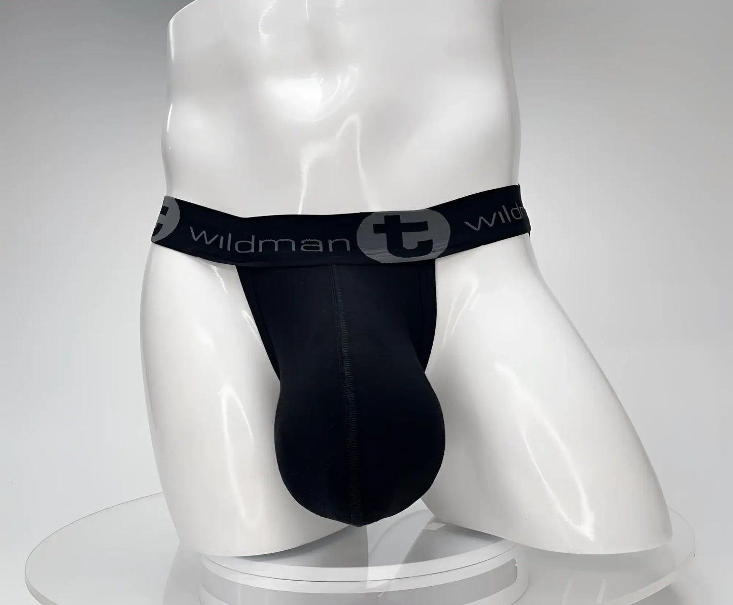 Black wildman cotton monster cock jockstrap with sleek form-fitting design and elastic waistband shown from the back