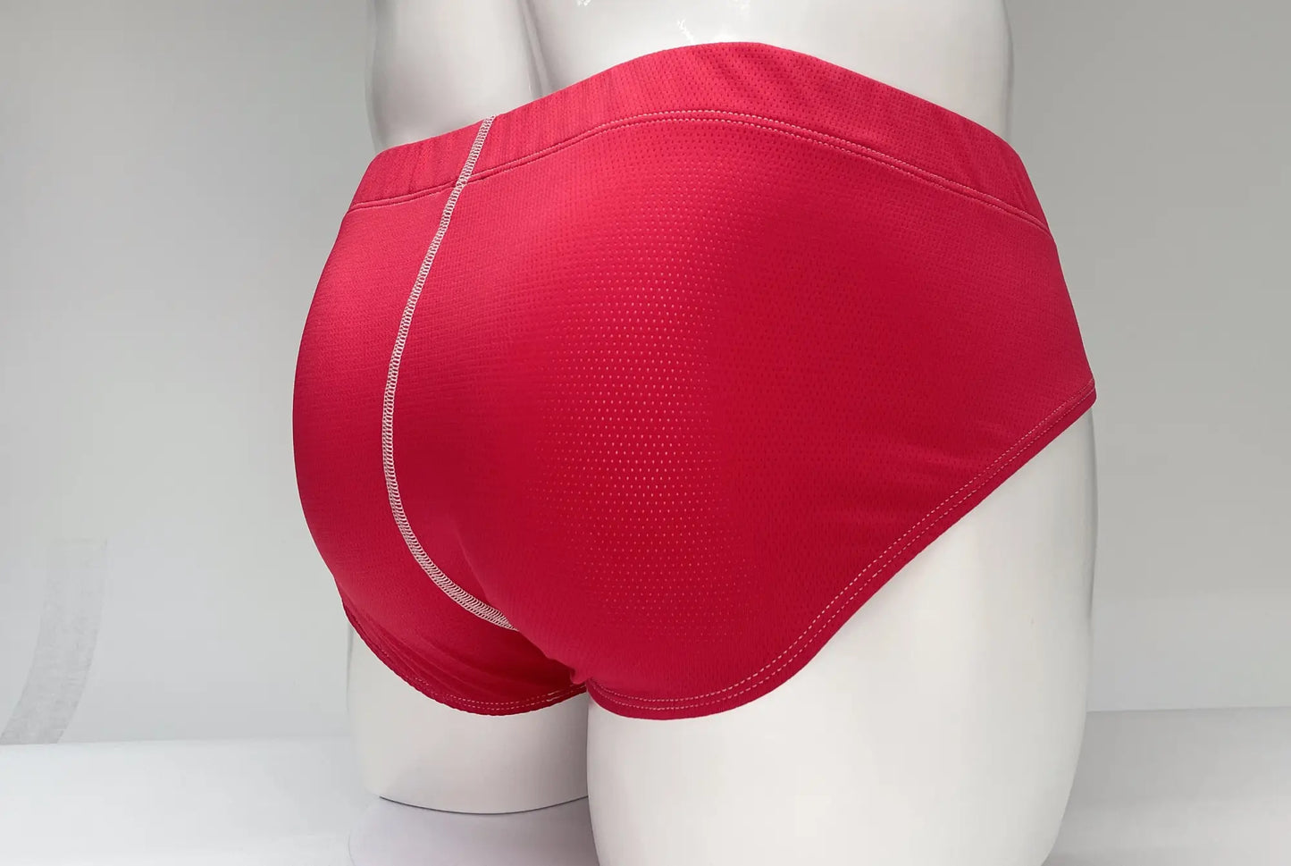 Wildmant mesh brief red athletic briefs with red mesh texture and white stitching along the side seam