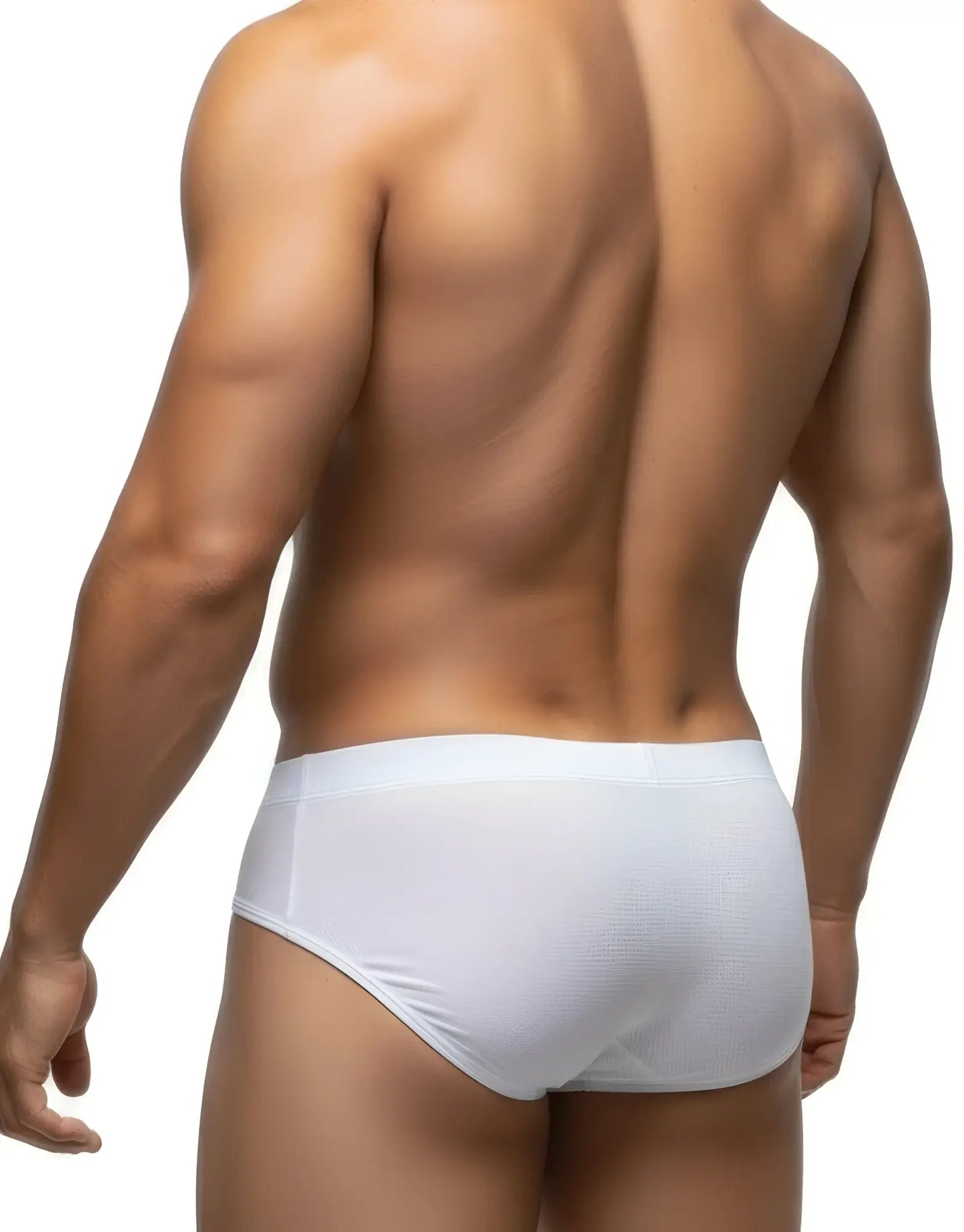 Back view of a man wearing white mesh briefs with a solid waistband.
