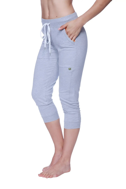 Light gray heathered women’s 3/4 cuffed capri yoga pants with white drawstring waistband and side pockets