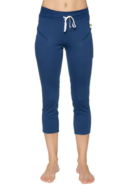 Navy blue women’s 4/5 length zipper pocket capri yoga pants with white drawstring waistband and side pockets