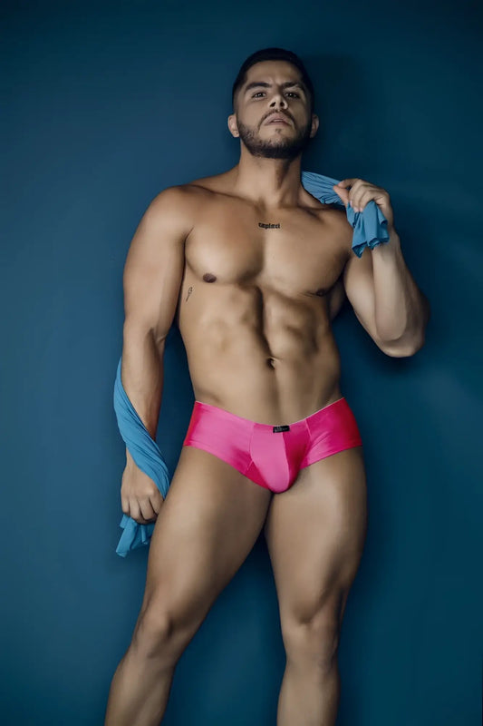 Vibrant pink satin microfiber briefs xtremen 91234 with sleek form-fitting design and small black brand tag at waistband