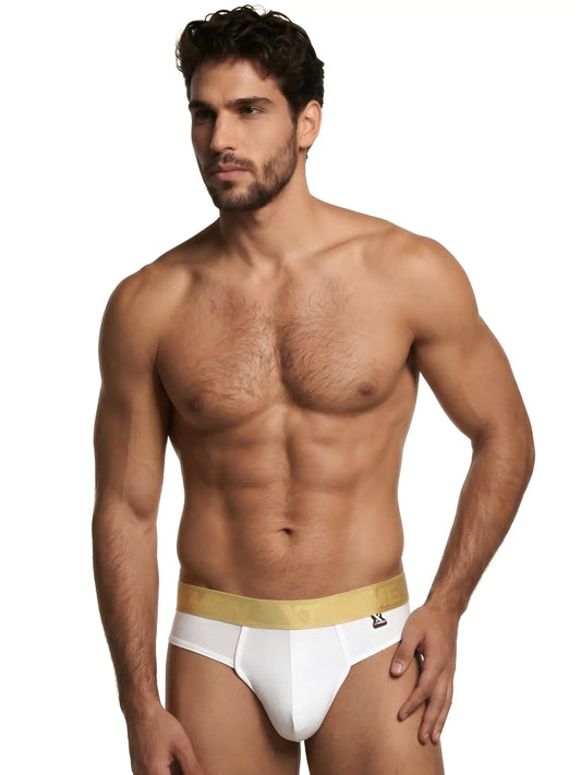Xtremen men's white brief with a metallic gold waistband and form-fitting, smooth fabric.