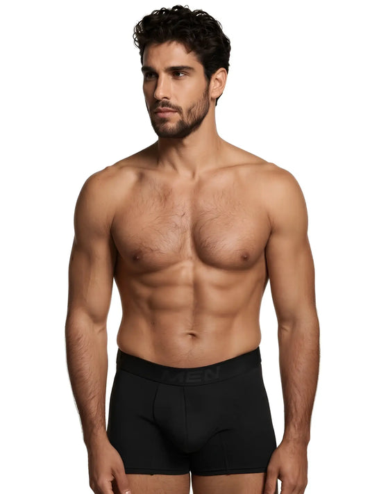 Xtremen black boxer brief with a fitted, matte fabric design and a branded waistband on a muscular male model.