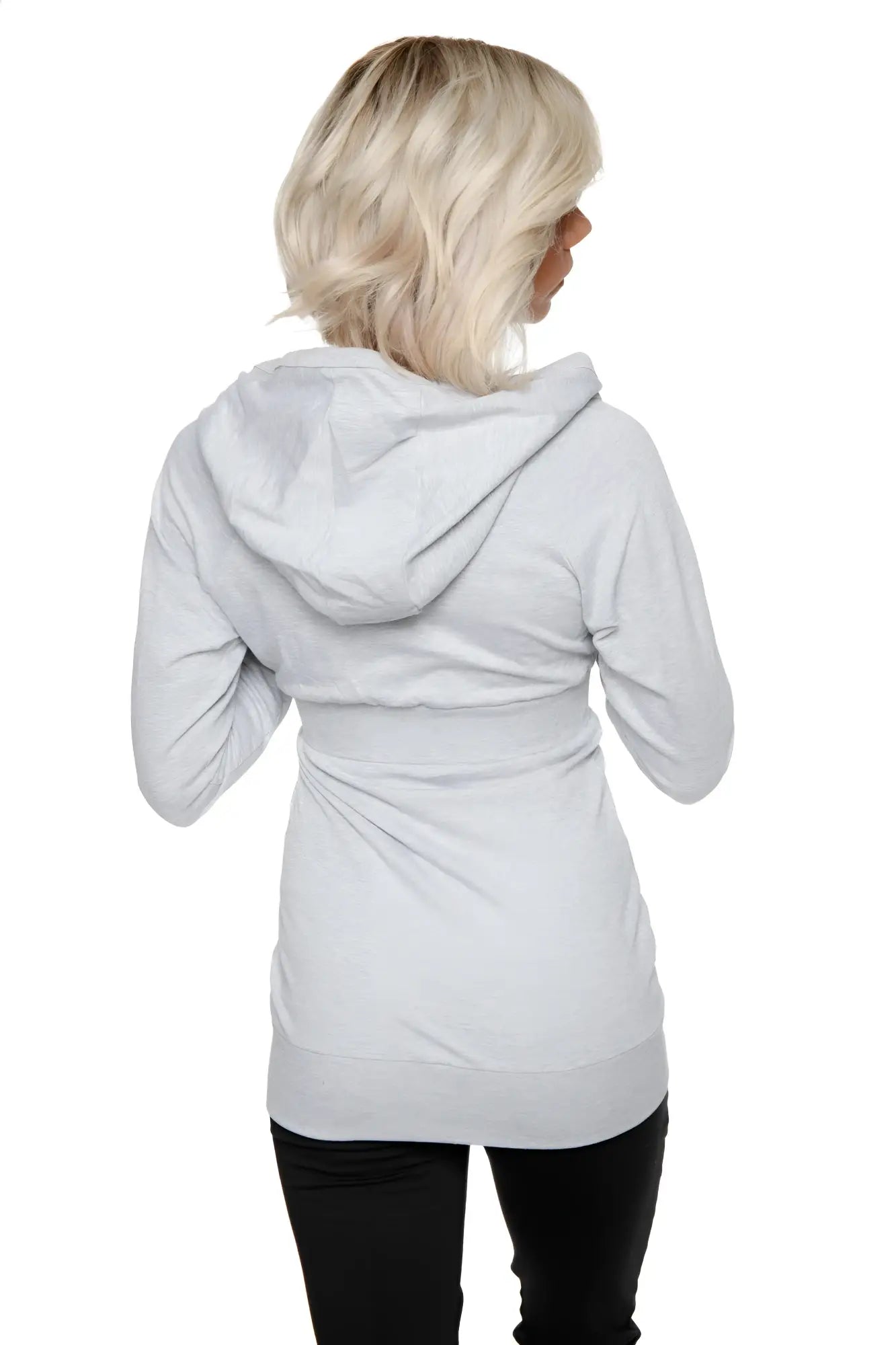 A soft heather grey zip-up long body travel hoodie jacket with a relaxed fit and subtle ruching at the waist