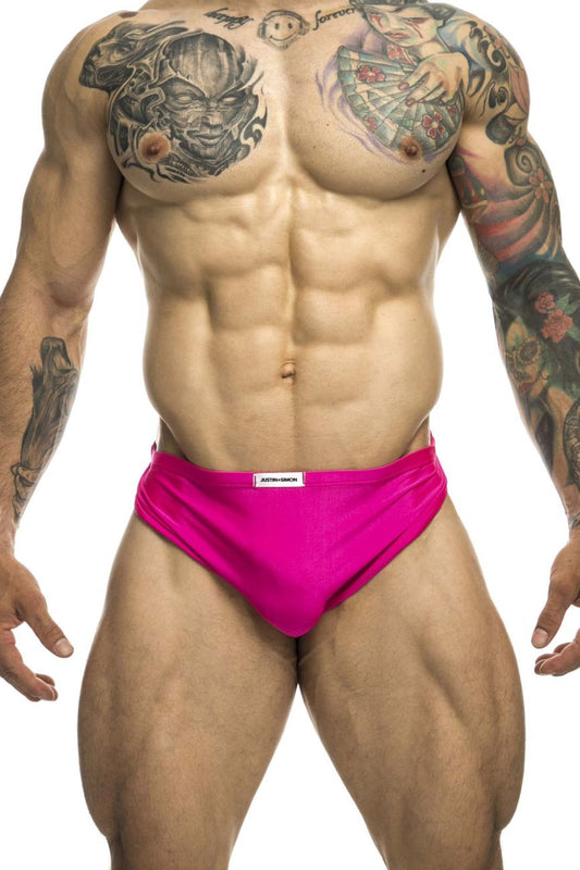 Bright pink form-fitting justin simon xsj09 running briefs with white brand tag at waistband for active use