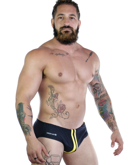 Black swim trunks sportivo bikini with yellow side stripes and wildmen logo on waistband for active use