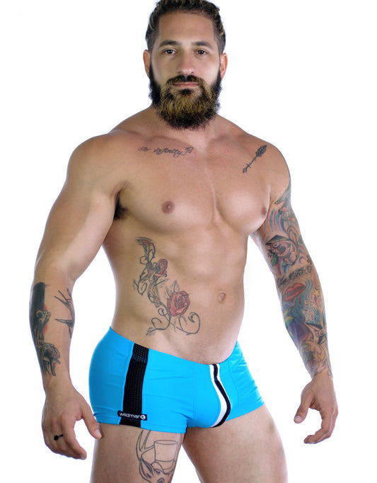 Sportivo square cut teal swim trunks in bright blue with black and white side stripes featuring wildman logo