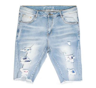 Light blue distressed denim shorts with frayed edges on a white background.
