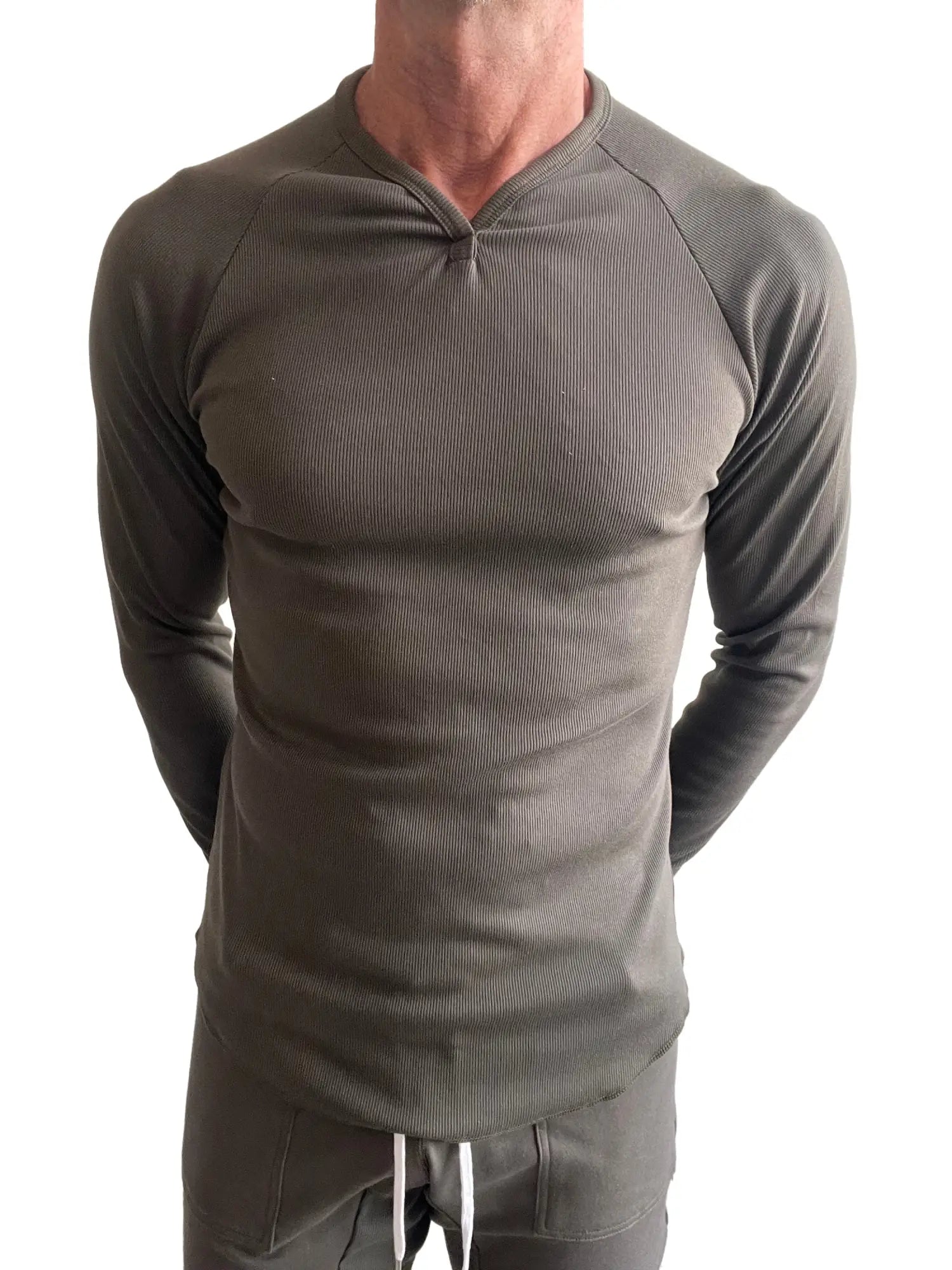 A close-up of a ribbed army green thermal long-sleeve shirt with a deep V-neckline.
