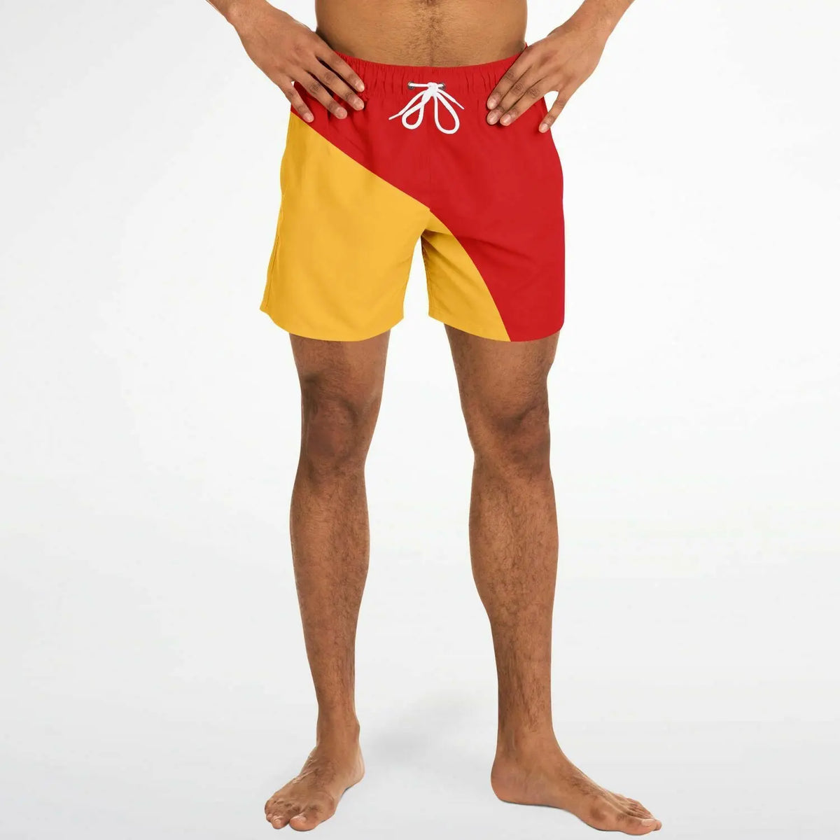 Men's swim shorts in red and yellow with a color-block design featuring an elastic waistband and drawstring by Maris Equi.