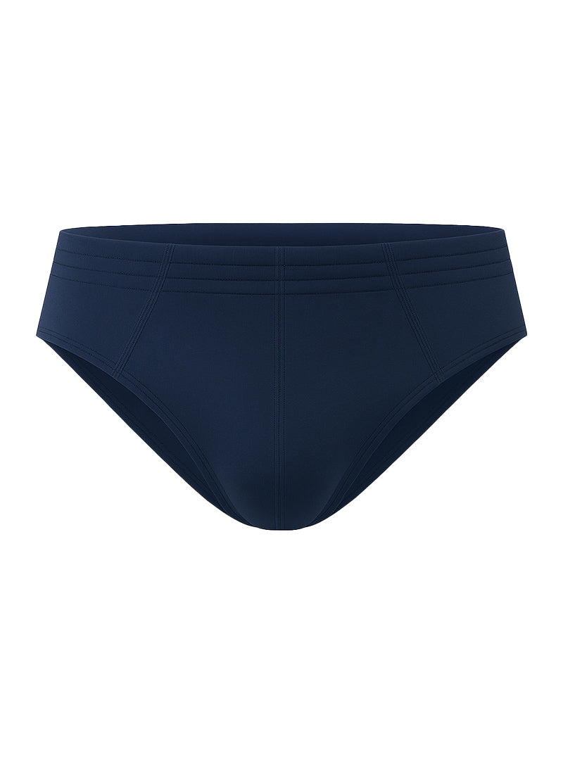 Navy blue 100% cotton brief swim trunks with smooth form-fitting fabric and subtle horizontal waistband stitching