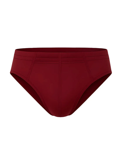 A sleek solid burgundy 100 percent cotton brief with smooth fabric finish and subtle seam detailing