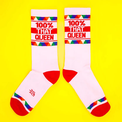 White 100 percent that queen crew socks with red toe and heel accents and colorful cuff patterns