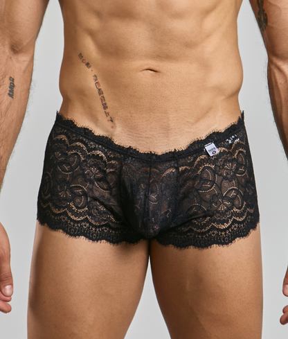 Black lace boxer short rose men’s underwear with intricate floral patterns and delicate frayed hem front view