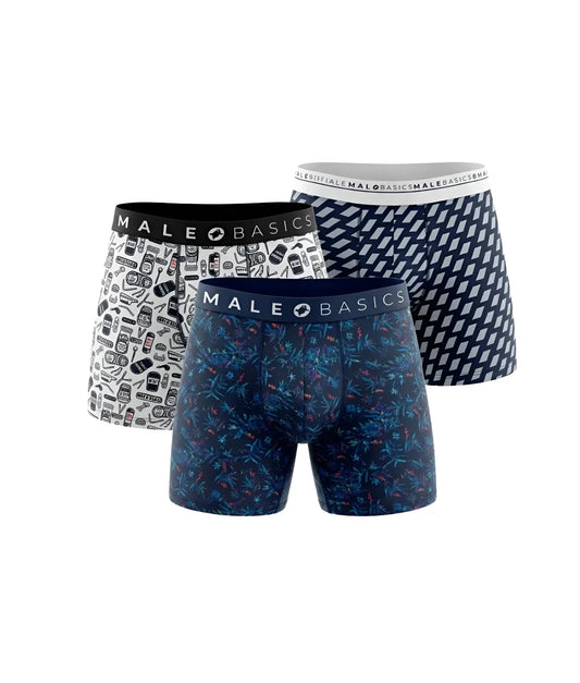 Three-pack male basics boxer briefs bundle with white retro tech, navy floral, and dark blue geometric designs