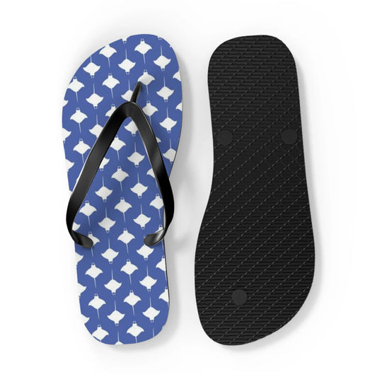 Blue flip-flops with manta ray pattern and black straps featuring a textured black sole by Maris Equi