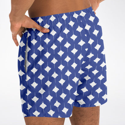 Men's swim shorts in blue with white manta ray pattern featuring an elastic waistband and side pockets by Maris Equi.