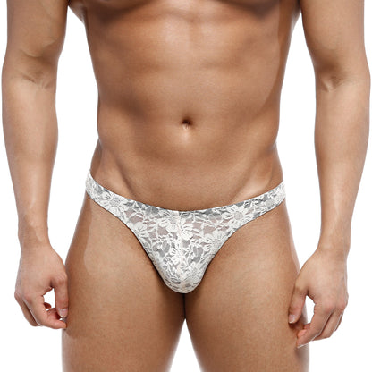 White lace thong with intricate floral patterns from metromalewear net g lace nude 1122-01 in a nude color
