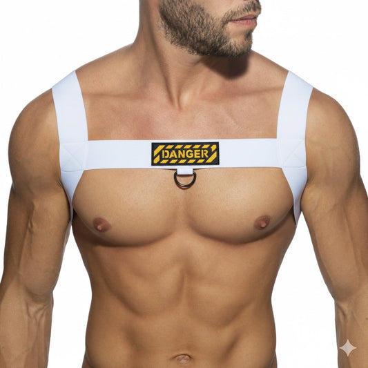 White fabric male harness with black and yellow danger patch and metal ring from MetroMaleWear