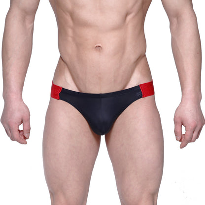 Black swim trunks with red side panels by Metromalewear suitable for swimming and beachwear