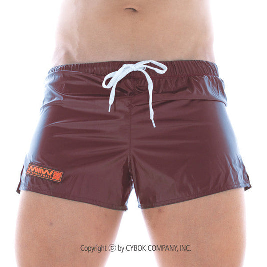 Maroon shiny iron sports short with white drawstring and small orange logo on left leg from MetroMaleWear
