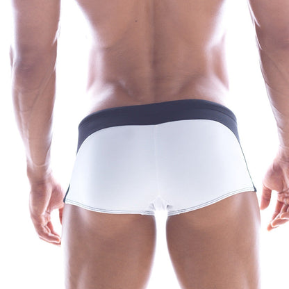 White swim trunks with navy blue waistband and trim from MetroMaleWear Arc Swim Boxer 4925-00 for comfortable swimming