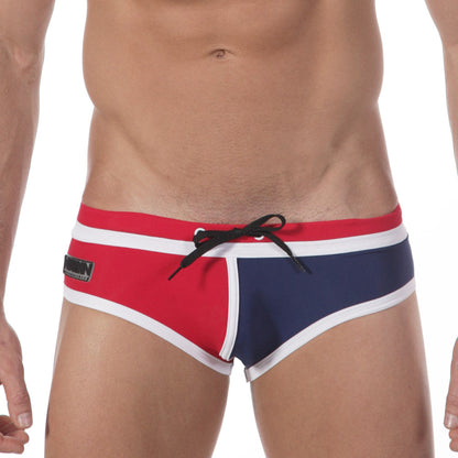 MetroMalewear double band swim brief navy features red and navy blue fabric with white trim and black drawstring for swimming