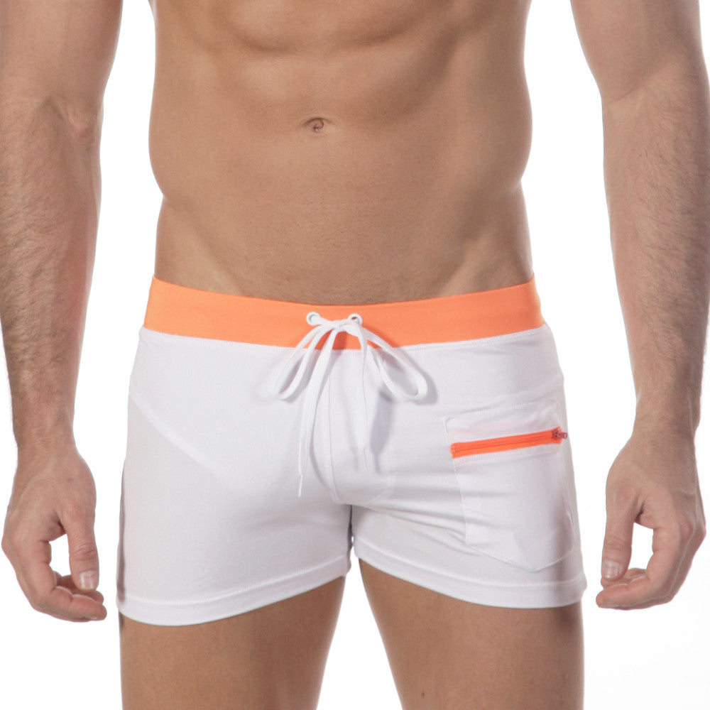 White swim trunks with bright orange waistband and zipper pocket featuring white drawstrings metroMalewear zipper swim boxer