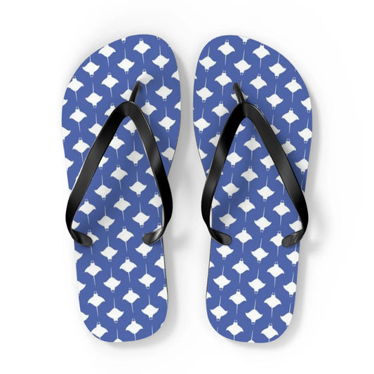 Blue flip-flops with white manta ray pattern and black straps designed by Maris Equi.