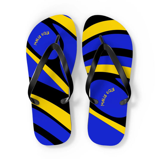 Blue and yellow patterned flip-flops with black straps designed by Maris Equi featuring a wave-like design.