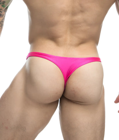 Bright pink Justin Simon classic tanga thong made of smooth fabric with a sleek and form-fitting design