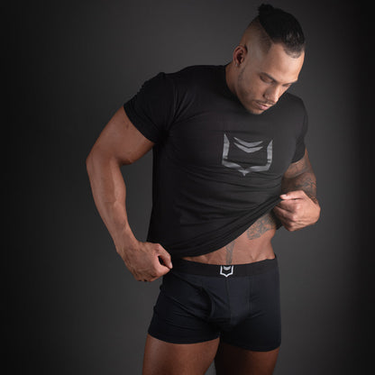Black athletic t-shirt with silver geometric logo on chest paired with sheath 2.1 dual pouch trunks 3 pack bundle