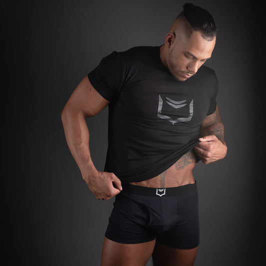 Black athletic t-shirt with silver geometric logo on chest paired with sheath 2.1 dual pouch trunks 3 pack bundle