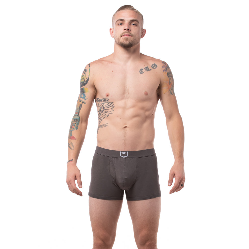 Dark gray men’s sheath 2.1 dual pouch trunks boxer briefs with subtle white logo on waistband 3 pack bundle