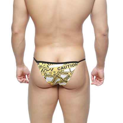 MetroMaleWear caution string bikini thong in yellow and white caution tape pattern with black trim front view