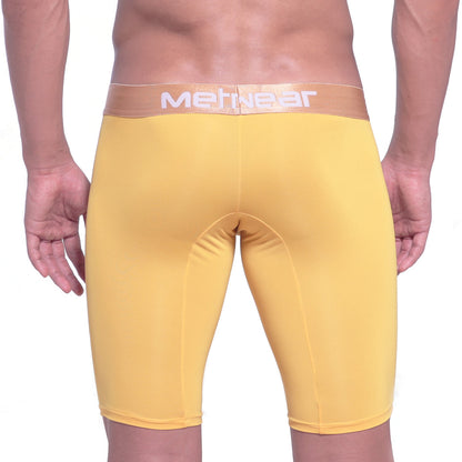 Yellow MetGear brand men’s compression shorts with tan waistband and white lettering MetroMaleWear Goldmine Long Short 15Inch