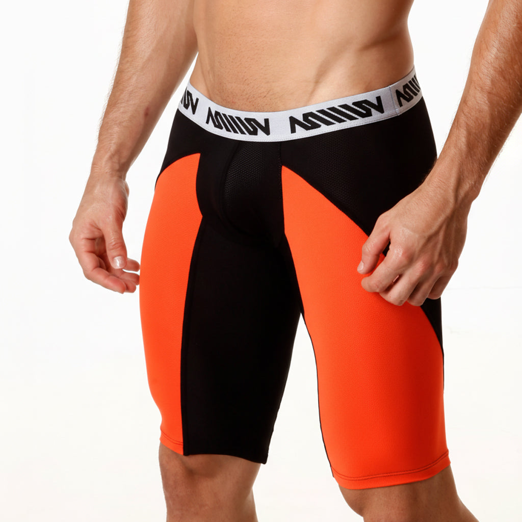 Black and orange metro malewear mesh long shorts with white waistband featuring million branding for athletic use