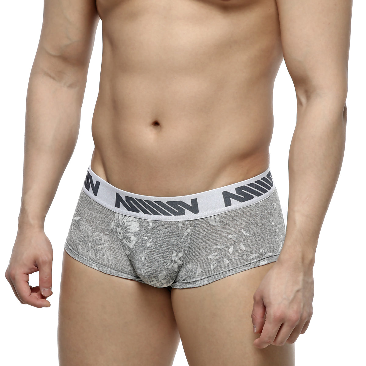 Gray floral-patterned jacquard briefs with white elastic waistband featuring black nomin lettering by metromalewear