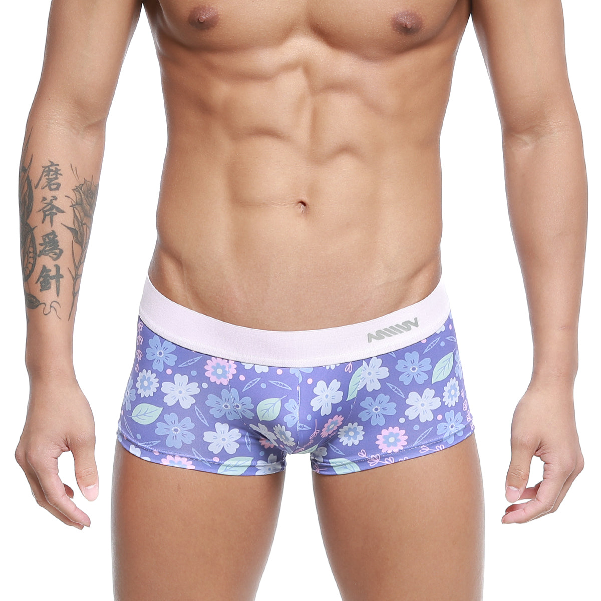 Purple floral-patterned men’s briefs with white elastic waistband featuring amin branding metro malewear jardin trunk 2026-15