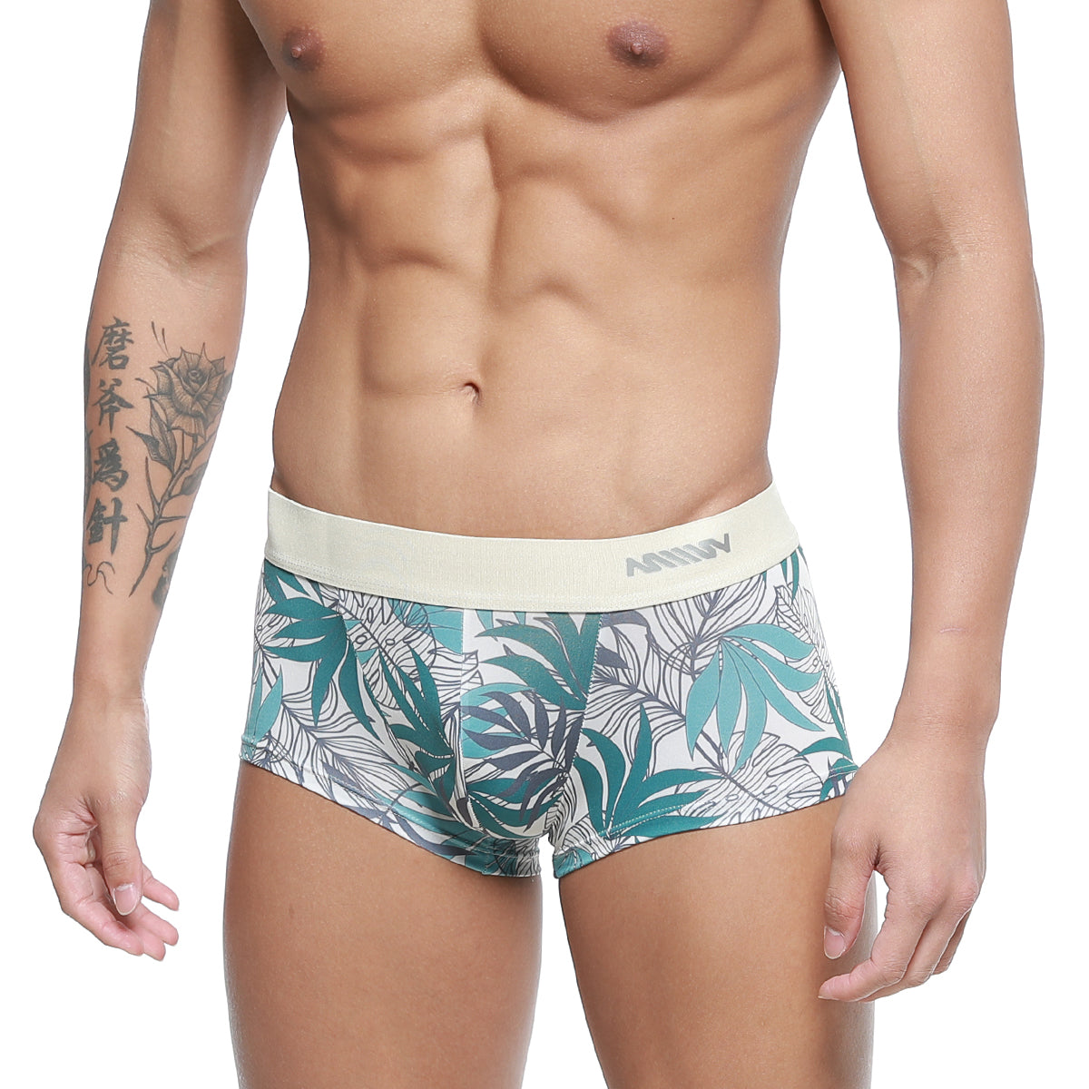 MetroMaleWear Meadow Trunk 2026-66 white briefs with vibrant teal and gray tropical leaf pattern and elastic waistband